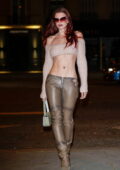 Julia Fox flaunts her washboard abs in a tiny crop top while stepping out during Paris Fashion Week in Paris, France