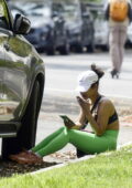 Christina Milian spotted in a sports bra and leggings while grabbing a smoke after her workout in Los Angeles