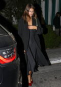 Kaia Gerber seen wearing all black during a dinner outing at San Vicente Bungalows in West Hollywood, California