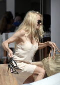 Pamela Anderson looks great in a beige slip dress while enjoying her vacation in St Barts, France