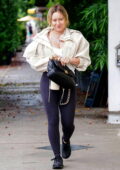 Hilary Duff shows off her toned legs in black leggings as she leaves after a workout session in Studio City, California