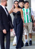 Georgina Rodriguez looks fashionable in a black corset top as she arrives at Marco Polo airport in Venice, Italy