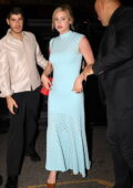 Lili Reinhart looks radiant in a baby blue dress while stepping out for dinner in Paris, France