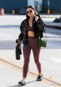 Lucy Hale sports a brown sports bra and leggings for a hot yoga class in West Hollywood, California