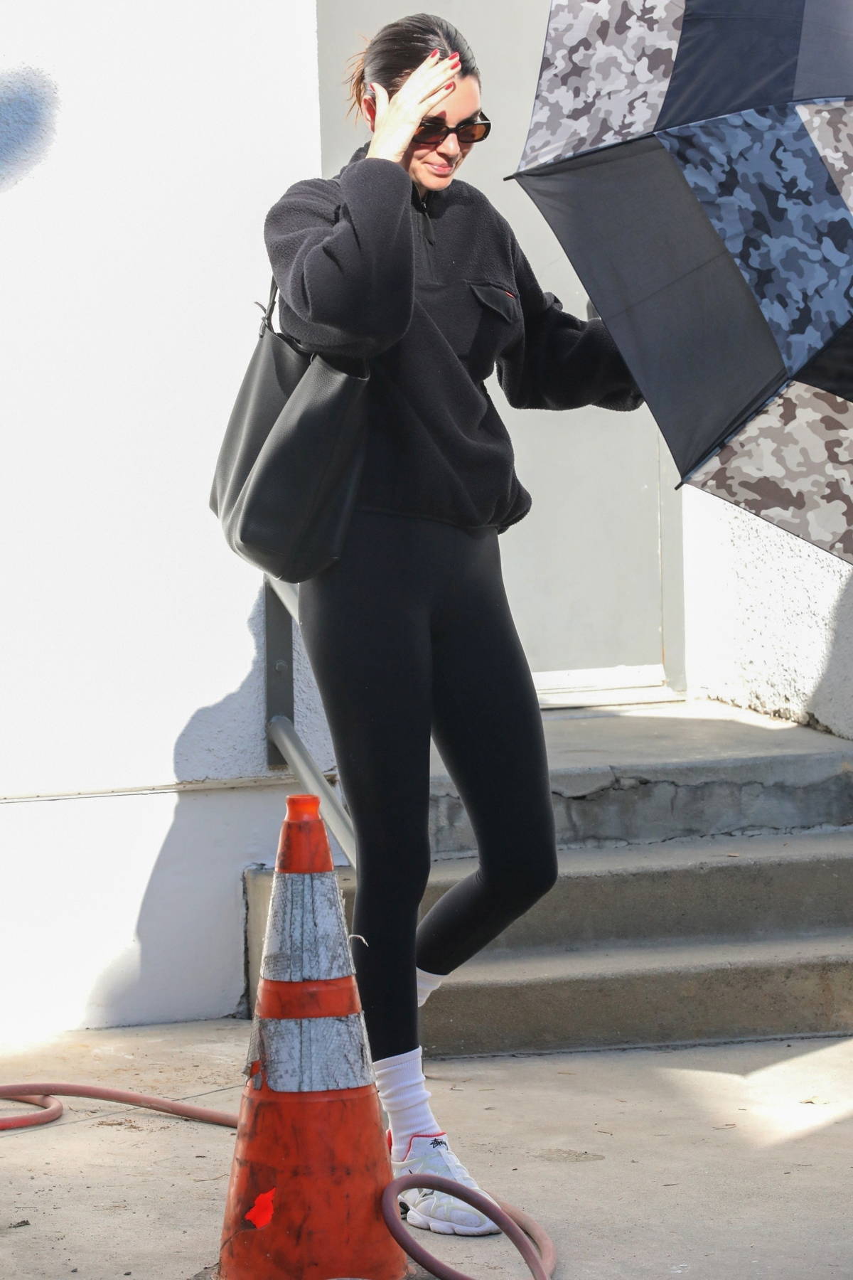 Kendall Jenner keeps a low profile as she leaves the gym with her friends in Los Angeles