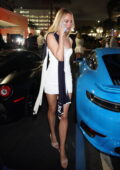 Kimberley Garner gets leggy in a white mini dress while stepping out in Miami Beach, Florida