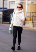 Olivia Wilde seen leaving the gym sporting a cream hoodie and black leggings in Studio City, California