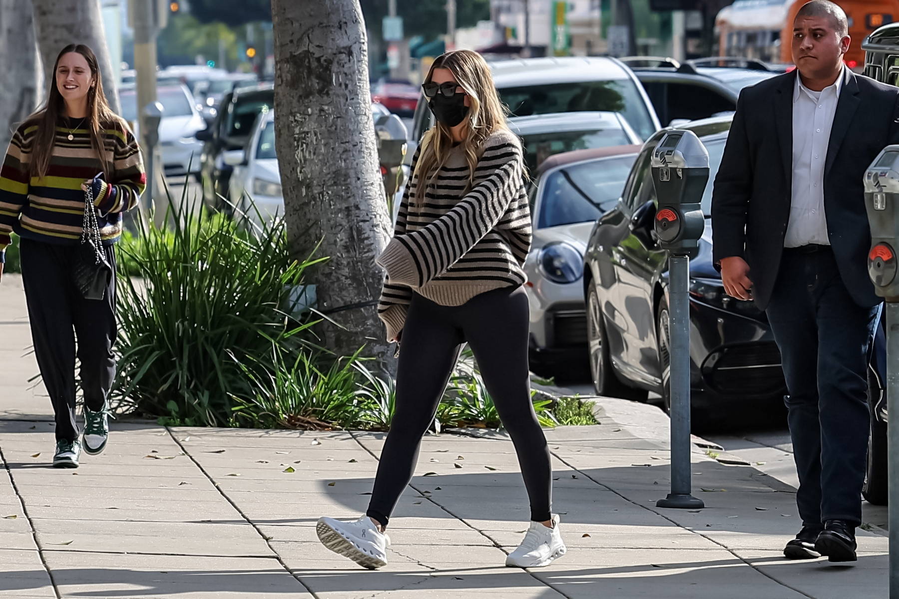 Sofia Richie covers her baby bump in an oversized sweater and black  leggings during a lunch outing in Beverly Hills, California-300124_5