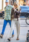 Gigi Hadid rocks a stylish aviator jacket as she arrives back to her apartment in New York City