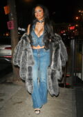Saweetie dons a stylish fur coat with her denim outfit while leaving The Mulberry Bar in New York City