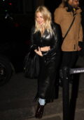 Sienna Miller is all smiles while stepping out for dinner at Caviar Kaspia in Paris, France