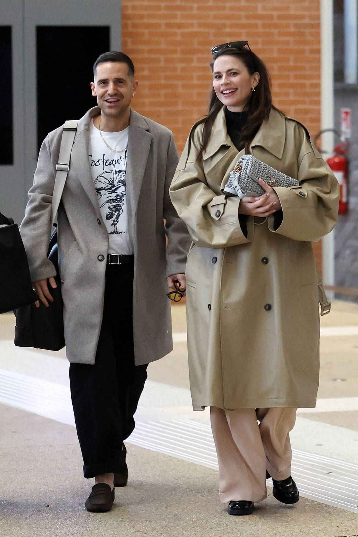 Hayley Atwell and fiancé Ned Wolfgang Kelly are all smiles as they arrive in Venice, Italy