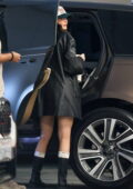 Kylie Jenner rocks a leather blazer with matching boots as she arrives for a business meeting in Los Angeles