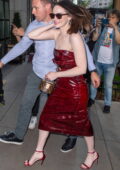 Emma Stone rocks a cherry red leather dress while attending a screening of 'Kinds of Kindness' in New York City