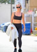 Olivia Wilde showcases her fit physique in a black sports bra and leggings while leaving the gym in Studio City, California