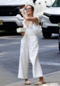 Millie Bobby Brown looks chic in her all white ensemble while heading to a heliport with hubby Jake Bongiovi in New York City