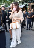 Alexandra Daddario is all smiles as she leaves her hotel in New York City