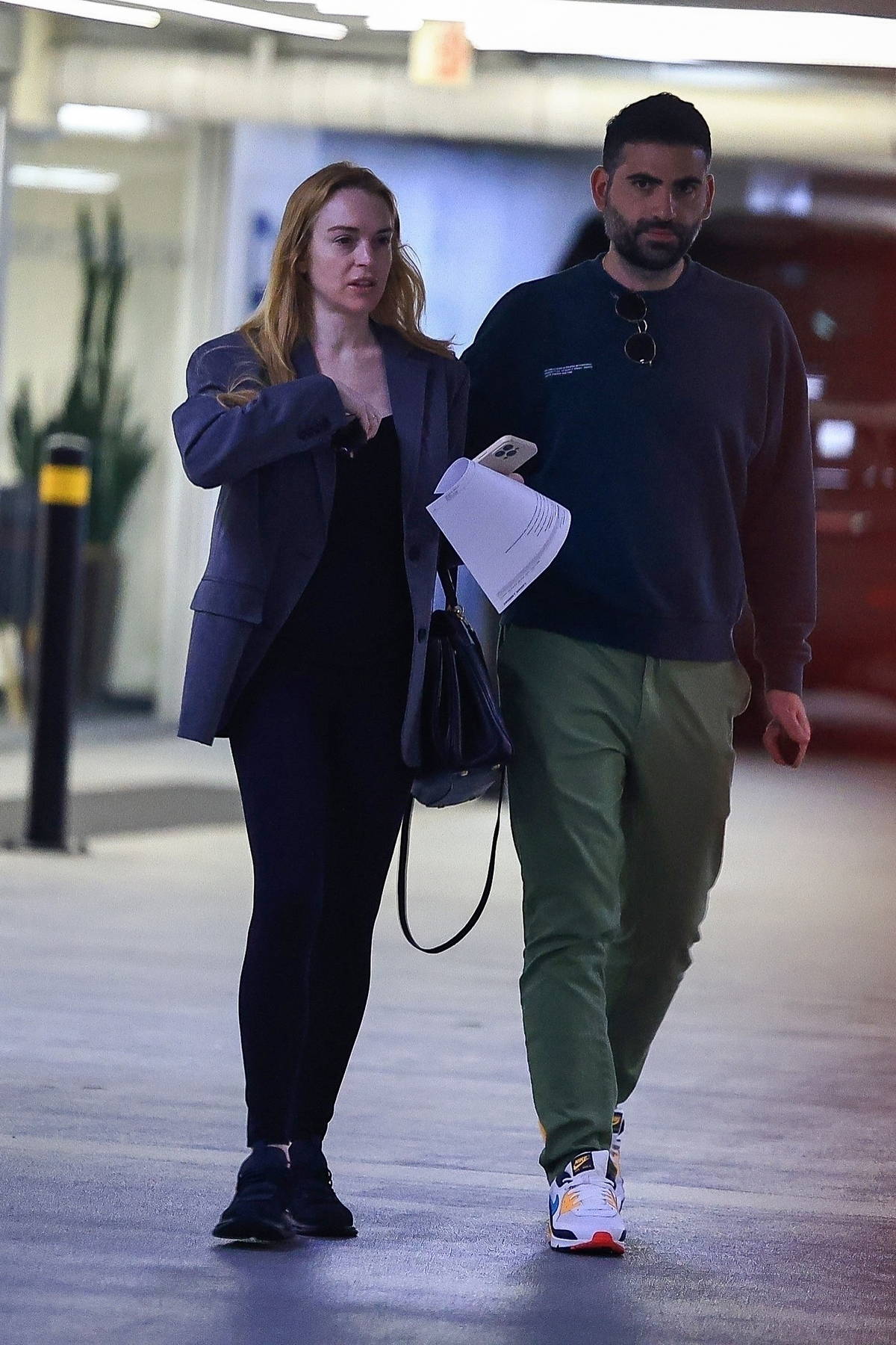 Lindsay Lohan keeps a busy afternoon with her husband Bader Shammas in Beverly Hills, California