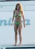 Rita Ora stuns in a green bikini while enjoying a day on a luxury yacht in Ibiza, Spain