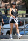 Shay Mitchell shows off her svelte figure in a black form-fitting romper while out for walk in Los Feliz, California