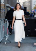 Emmy Rossum looks radiant in a white dress while stepping out in New York City