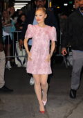 Ariana Grande looks pretty in pink while attending the 'Wicked' screening at AMC Theatre in New York City