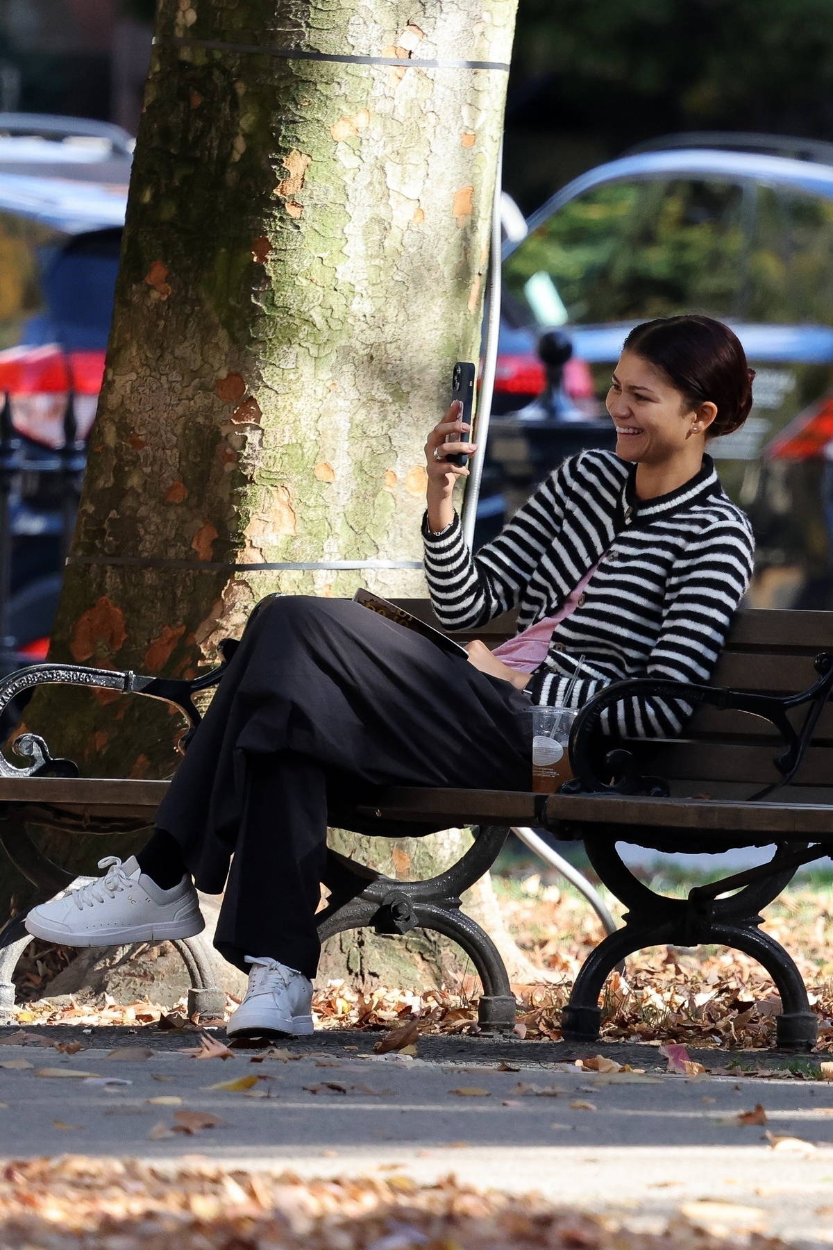 Zendaya is all smiles while snapping photos of boyfriend Tom Holland in Boston, Massachusetts